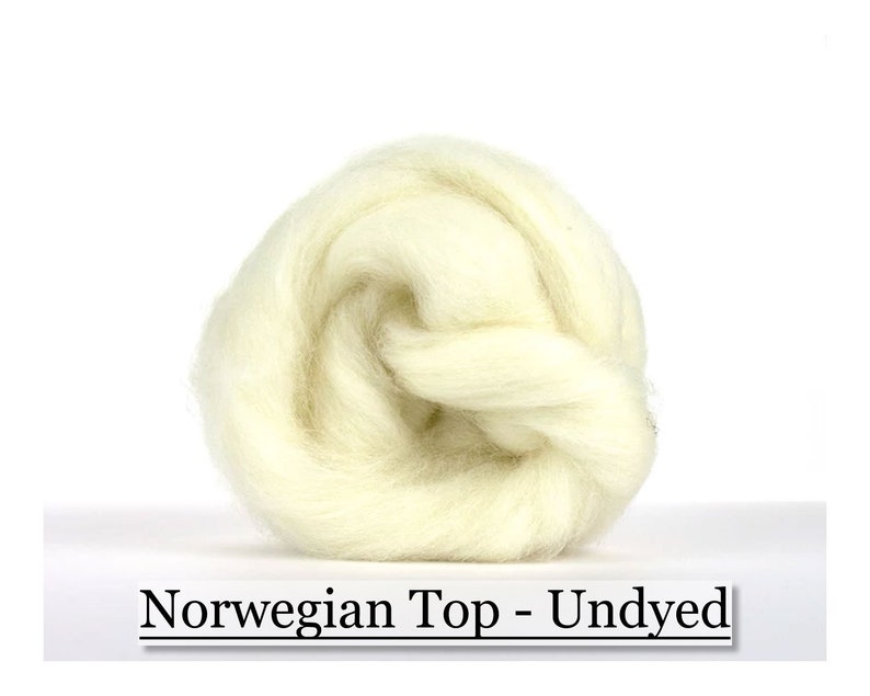 May include: A tightly coiled, undyed, off-white Norwegian Top wool fiber. The wool is soft and appears to be ready for spinning or felting. The text "Norwegian Top - Undyed" is displayed below the wool.