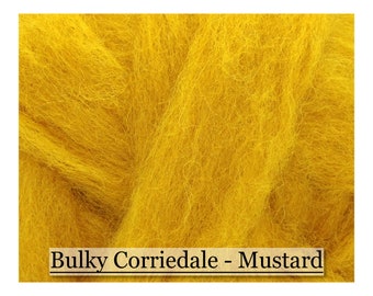 May include: Close-up of mustard-colored Bulky Corriedale wool roving. The wool fibers are thick and textured, with a soft, fluffy appearance. The text "Bulky Corriedale - Mustard" is displayed in a rectangular box at the bottom of the image.