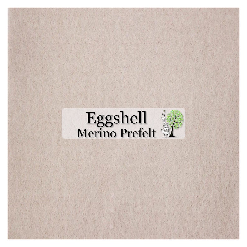 May include: A light beige, textured fabric with a label that reads "Eggshell Merino Prefelt." The label features a tree illustration with a green crown and a gray trunk. The fabric has a soft, felted appearance.