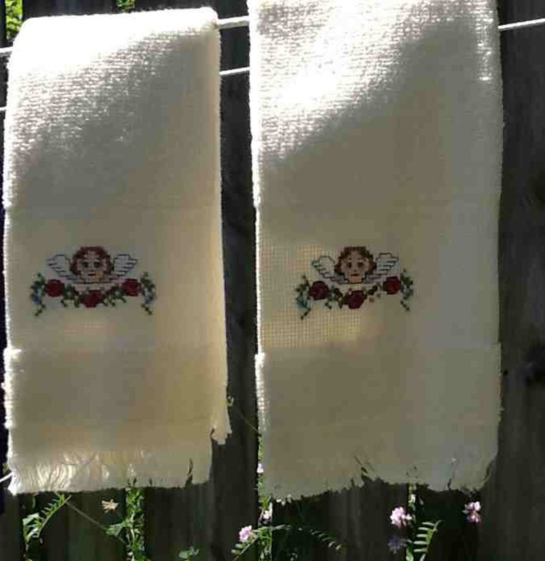 May include: A set of three ceramic nesting bowls in graduating sizes. The bowls are white with a blue floral pattern. The largest bowl is 6 inches in diameter, the medium bowl is 5 inches, and the smallest is 4 inches.