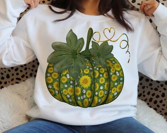 Design PNG de girassol e abóbora floral para sublimação, com flores fofas, clipart de outono encantador, estilo cottagecore, tema de Halloween, botânico e estampa para camiseta.