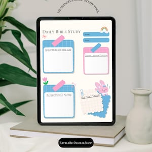 May include: A digital tablet displaying a Daily Bible Study template with sections for Scripture of the Day, Today I Thank God For, Reflections/Notes, and My Next Verse. The layout features blue and pink grid boxes, a rainbow, and a pink bunny graphic.