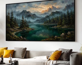 May include: A large rectangular landscape painting in a black frame depicting a serene lake surrounded by dense evergreen forests and towering, mist-covered mountains under a dramatic, cloudy sky with golden light breaking through the clouds.