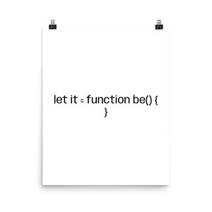 May include: A white rectangular poster featuring the black text let it = function be() { } centered on the page. The poster is held by two black metal clips at the top corners, providing a clean and simple display of the programming code.