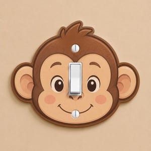 May include: A light switch cover plate shaped like a cartoon monkey face. The plate features a brown and tan color palette with pink cheeks, large dark eyes, and a smiling mouth. A white toggle switch is centered, secured by two silver screws.