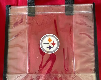 Bolsa transparente de 12x12 pulgadas con borde negro, lista para usar en el estadio de los Pittsburgh Steelers.
