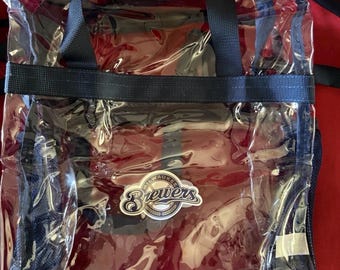 Bolsa transparente de 30x30 cm de los Milwaukee Brewers con asa y correa de hombro extraíble.