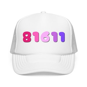May include: A white trucker cap featuring a mesh back and a solid front panel. The front displays the number 81611 in a gradient of pink, light pink, and purple bubble-style font. Each digit contains a small heart cutout within its shape.