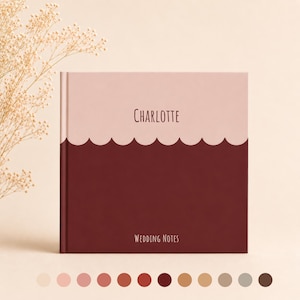 May include: A square book with a two-tone cover featuring a light pink top section and a dark maroon bottom section separated by a scalloped edge. The name Charlotte is printed in dark text on the pink section, and Wedding Notes is printed below.
