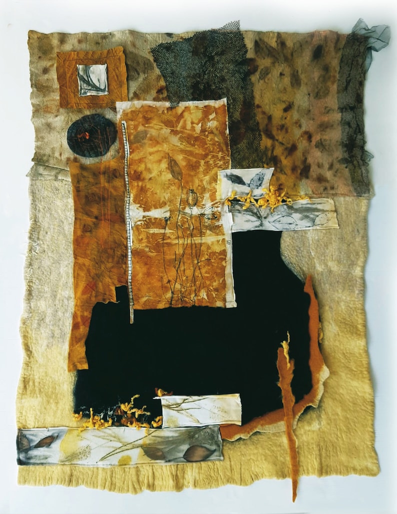 May include: Abstract art piece made with fabric scraps in shades of brown, yellow, and black. The fabric is layered and stitched together to create a textured and dimensional surface.