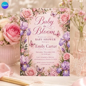 May include: A rectangular baby shower invitation card with a light pink background, featuring a floral border of pink roses and purple irises with butterflies. The text reads: Baby in Bloom, Please join us for a baby shower honoring Emily Carter.