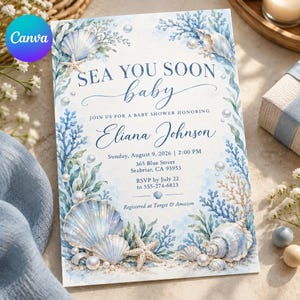 May include: A rectangular baby shower invitation card featuring watercolour illustrations of blue coral, seashells, starfish, and pearls. The text reads: SEA YOU SOON baby, JOIN US FOR A BABY SHOWER HONORING Eliana Johnson, Sunday, August 9, 2026, 2:00 PM.