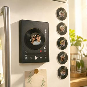 May include: A black rectangular magnetic frame designed like a music player interface with a central circular photo cutout, accompanied by five smaller circular magnetic photo frames, all featuring a vinyl record aesthetic.