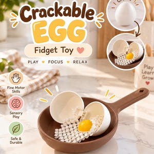 Puede incluir: Un juguete fidget con forma de huevo blanco en una sartén de juguete marrón. El huevo se abre para revelar una yema amarilla y un interior blanco texturizado. El texto dice Crackable EGG Fidget Toy, Play, Focus, Relax, Fine Motor Skills, Sensory Play, Safe & Durable, Crack!