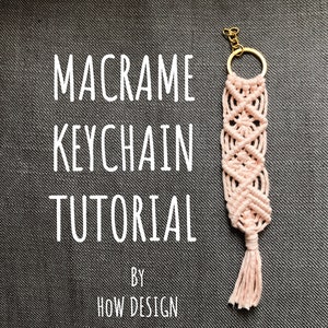 May include: A pink macrame keychain with a gold key ring. The keychain has a tassel and is made with a knotting technique. The text "MACRAME KEYCHAIN TUTORIAL BY HOW DESIGN" is written in white on a dark grey background.