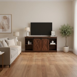 May include: A dark brown wooden media console featuring two sliding barn-style doors with an X-pattern design, black metal hardware, and open shelving on both sides, positioned against a wall beneath a flat-screen television.