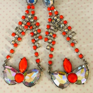 Vintage aurora Borealis crystal dangle earrings with vivid orange stones, rhinestones Galore!