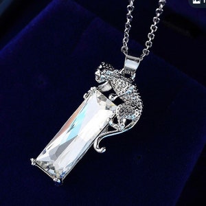 Panther Necklace. Cubic zirconia stone, 28 inch silver tone chain. Brand new Condition