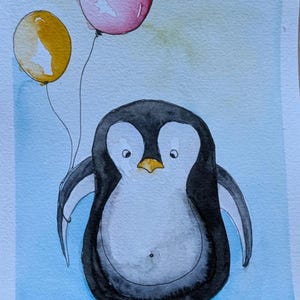May include: A watercolor painting of a penguin with a black and white body, yellow feet, and a yellow beak. The penguin is holding two balloons, one yellow and one pink, against a light blue background with soft, blended watercolor washes.