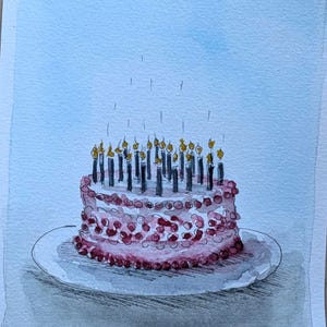 May include: A watercolor painting of a round cake covered in pink frosting and red berries, topped with numerous lit black candles with yellow flames. The cake sits on a white plate against a light blue background, with the signature 'nic/26' at the bottom.