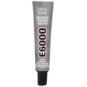 May include: A tube of E6000 industrial strength adhesive. The tube is grey with black text and a black cap. The label indicates 5.3 ml of adhesive. Warning text about vapor and cancer is also present.