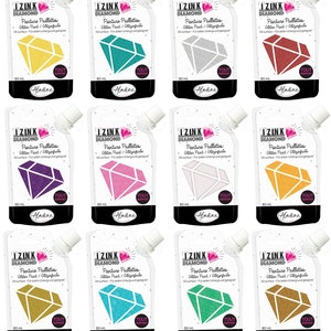 May include: Twelve 80 ml bottles of I Zink Diamond glitter paint. Each bottle features a diamond shape with a different glitter color: gold, teal, silver, red, purple, pink, white, yellow, gold, turquoise, green, and copper.