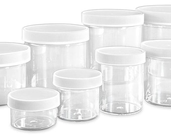 May include: Set of seven clear plastic jars with white lids of varying sizes. The jars are empty and have a smooth, clear finish.