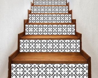 May include: A set of black and white patterned stair treads. The treads are made of a durable vinyl material and are easy to apply. They are perfect for adding a touch of style to any staircase.