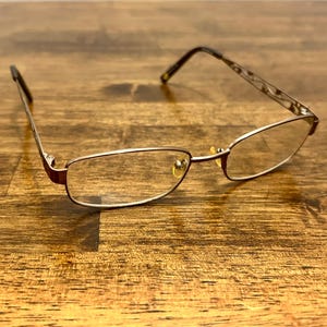 Vintage Linda Evans Eyeglasses, Brown Rectangular Metal Frames, Floral Vine Cutout Temples, Sans Pareil 330, 52-17-135