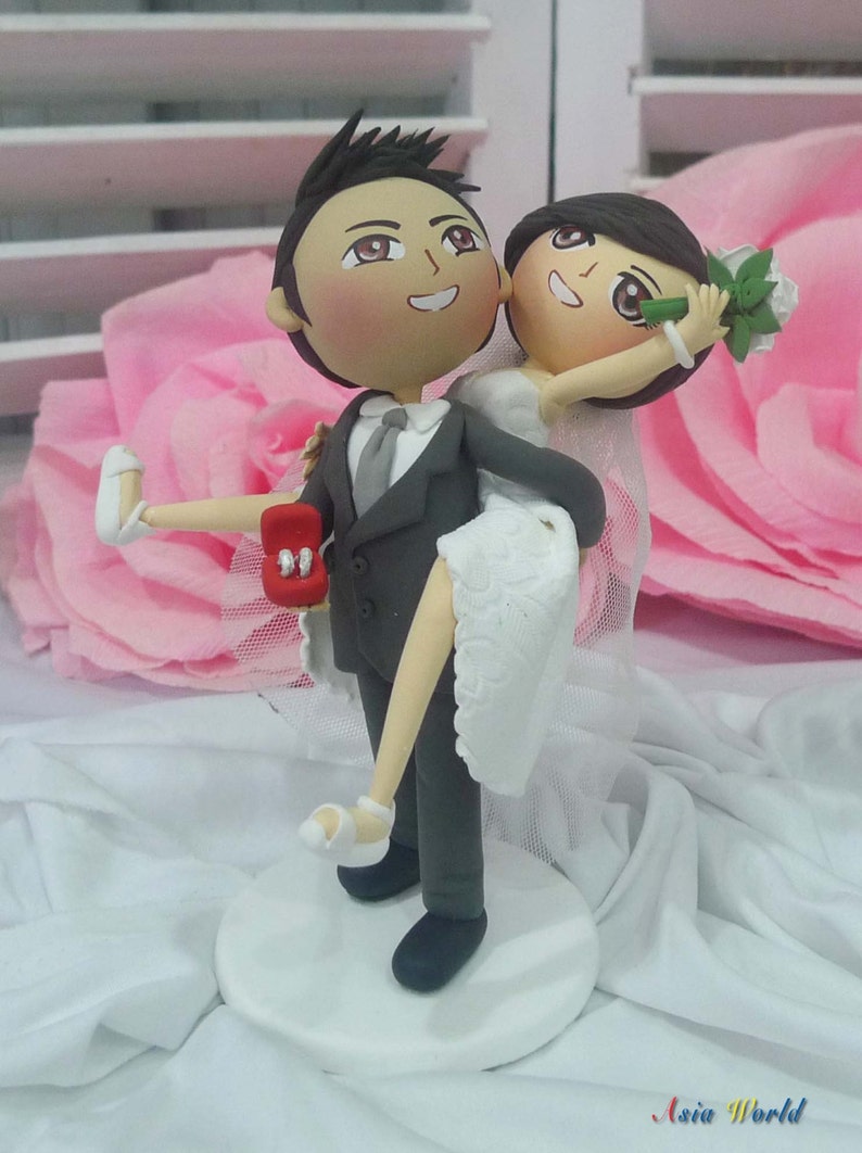 Wedding cake topper Groom carry Bride on back clay doll hold | Etsy