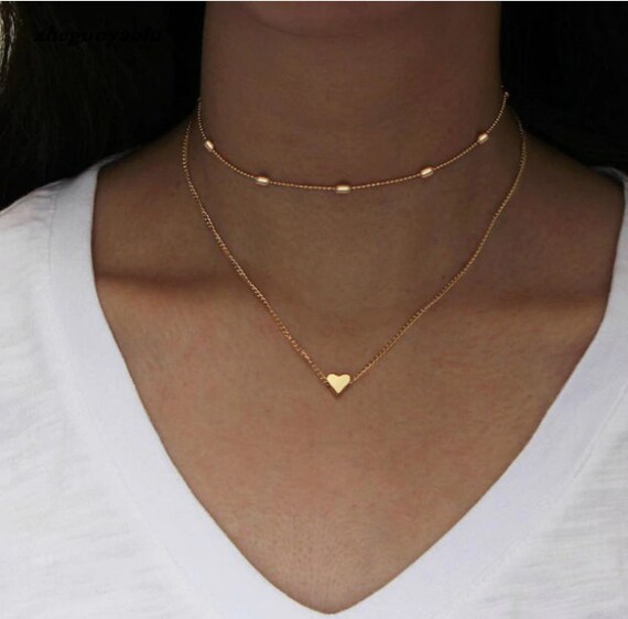 Double chain heart best sale necklace