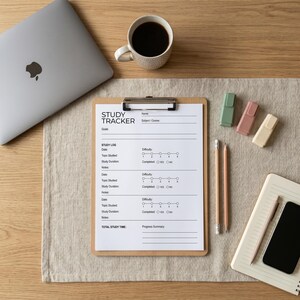 May include: A study tracker sheet on a wooden clipboard with a silver clip. The white paper features black text including Study Tracker, Name, Subject, Course, Goals, Study Log, Date, Topic Studied, Difficulty, Study Duration, Completed, and Notes.
