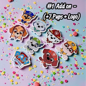 May include: A collection of Paw Patrol character stickers featuring seven individual puppy figures and one Paw Patrol logo sticker. The text #1 Add on - (+7 Pups +Logo) is printed in black above the colorful cartoon dog illustrations.