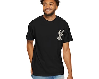 May include: A black short-sleeve t-shirt featuring a small graphic on the left chest. The design depicts a crescent moon positioned above a stylized, swirling ocean wave, rendered in shades of white, grey, and black with fine line details.