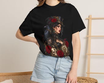 May include: A black t-shirt featuring a graphic print of a person wearing a top hat adorned with a red rose, accompanied by a raven, a skull, and a pocket watch. The design incorporates intricate lace details and additional red roses.