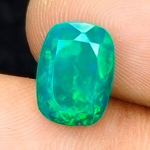 2 Cts Natural Welo Ethiopian Opal Gemstone, Faceted Rainbow Flash, Jewelry Making Stone.