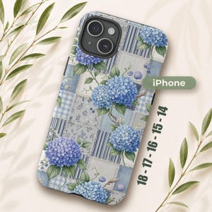 May include: A phone case featuring a patchwork design of blue hydrangea flowers, light blue gingham, and striped patterns. The case includes text that reads iPhone 14-15-16-17-18. The design incorporates green leaves and small seashells.