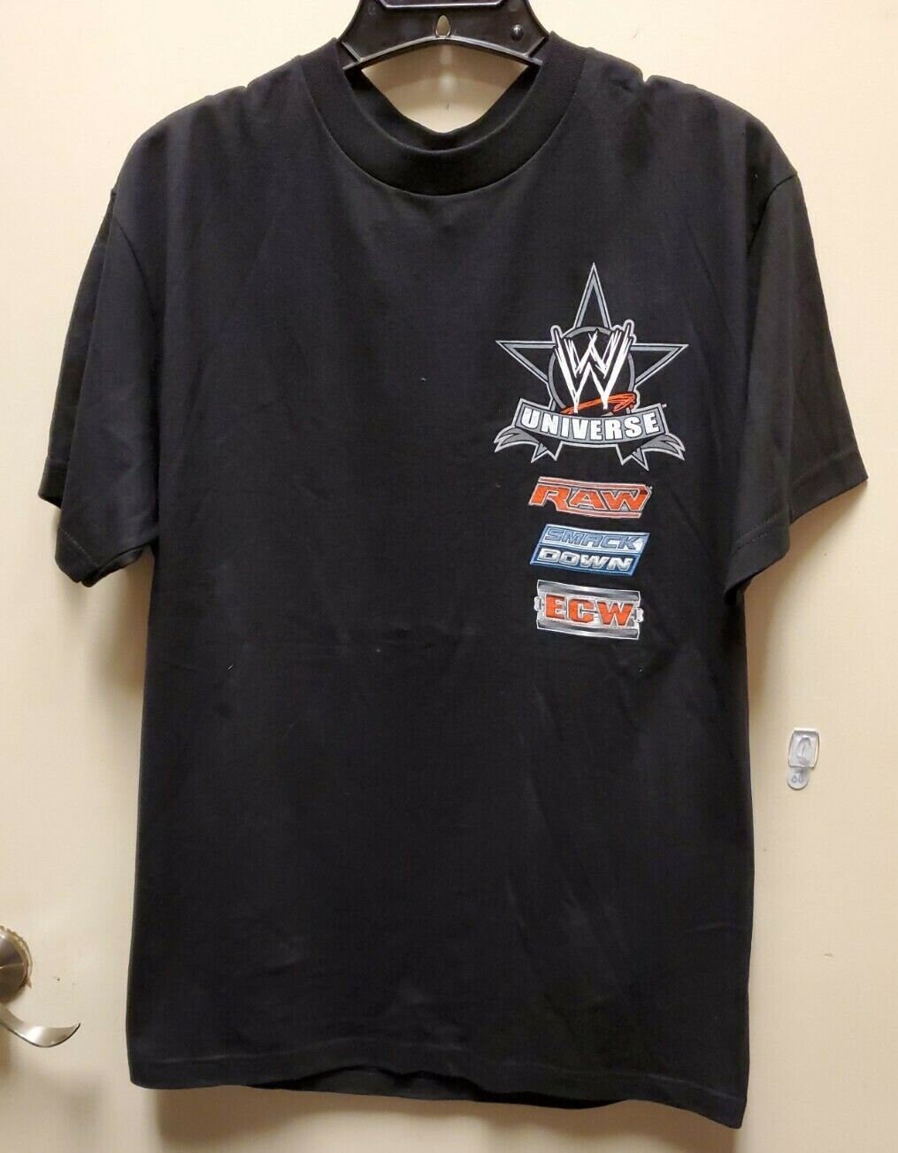 2008 WWE/ ミステリオ 総柄 レスリング Tシャツ 2008 WWE/ ミステリオ 総柄 レスリング Tシャツ