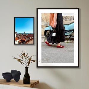 woman walking with a bottle of wine in Sitges, Spain.jpg