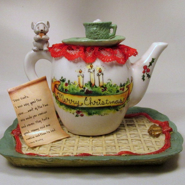 Reduced! Tiny Mouse Eating One of Santa's Cookies While Sitting on the Teapot Handle