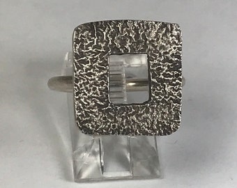 SOLD.                                     Darling little square ring.