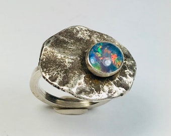 Opal triplet and reticulated sterling silver ring.