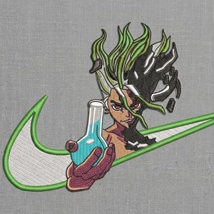 May include: An embroidered patch featuring a stylized anime character with spiky green and black hair, holding a blue liquid-filled glass flask. The character is positioned within a large, green-outlined white swoosh shape on a gray fabric background.