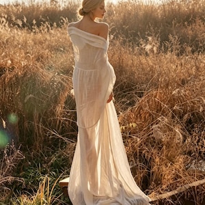 white maxi dress with brown belt Classic white dress from SASS tan belt with gold buckle included