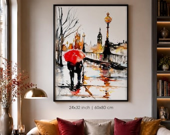 May include: A framed watercolor-style wall art print depicting a rainy London street scene with a prominent red umbrella, Big Ben, and a street lamp. The artwork measures 24x32 inches and features a black frame, showcasing a silhouette of figures.