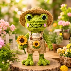 Schema PDF per realizzare all'uncinetto una rana amigurumi a forma di contadino di girasoli, un peluche a forma di animale da fattoria, ideale per principianti. Download immediato.