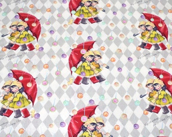 May include: A white fabric with a repeating pattern of two girls holding red umbrellas with a gray and white diamond pattern background. The girls are wearing yellow raincoats and red boots. The text "Keep Smiling for a Rainy Day" is repeated throughout the fabric.