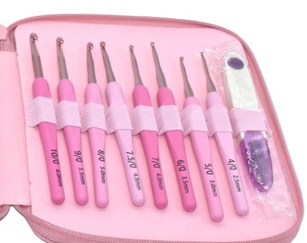 May include: A set of 8 pink crochet hooks in a pink zippered case. The hooks are labelled with their size in UK and mm: 4/0 (2.5mm), 5/0 (3.0mm), 6/0 (3.5mm), 7/0 (4.0mm), 7.5/0 (4.5mm), 8/0 (5.0mm), 9/0 (5.5mm), and 10/0 (6.0mm).