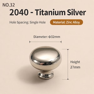 May include: A titanium silver cabinet knob made of zinc alloy with a single hole mounting. The knob features a smooth, rounded top with a diameter of 32mm and a height of 27mm. Text on the image includes NO.32, 2040 - Titanium Silver, Hole Spacing: Single Hole, Material: Zinc Alloy, Diameter: 32mm, and Height: 27mm.