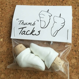 White &quot;thumb&quot; tacks